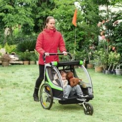 HOMCOM Remorque Vélo Jogger 2 En 1 Pour Enfant Drapeau Roue Avant Pivotante Réflecteurs Et Barre D'attelage Inclus Vert Noir - Vert -Cage, caisse et transport pour chien Soldes 60072220 4